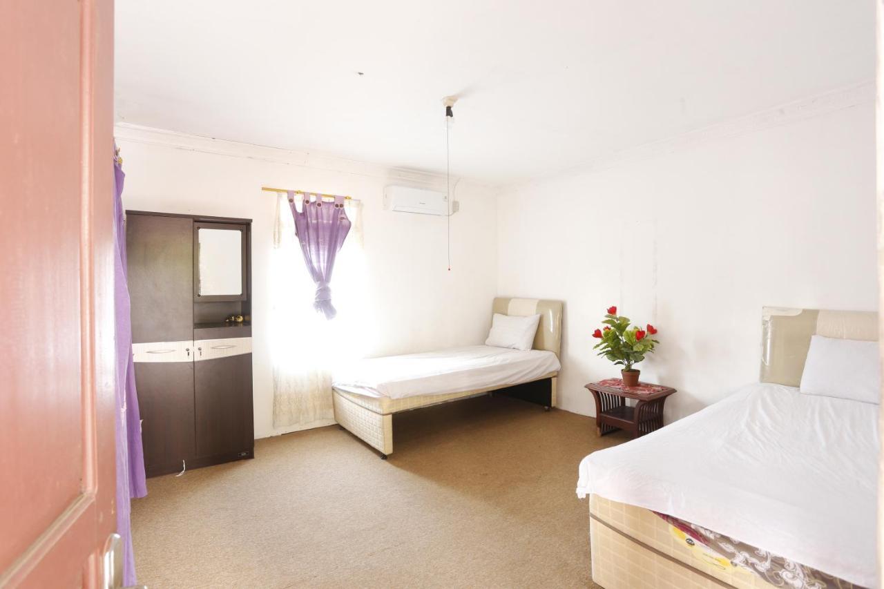 Oyo 93380 Penginapan Mangkoe Barokah Tanah Grogot Exteriör bild