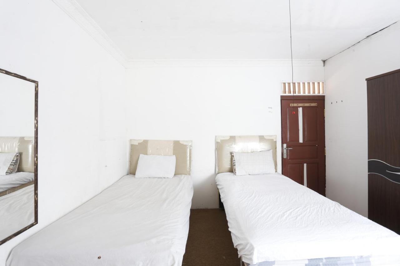 Oyo 93380 Penginapan Mangkoe Barokah Tanah Grogot Exteriör bild