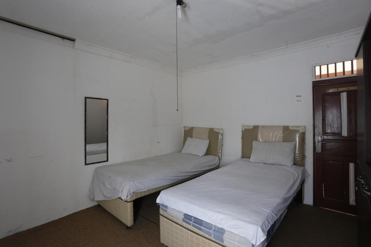 Oyo 93380 Penginapan Mangkoe Barokah Tanah Grogot Exteriör bild