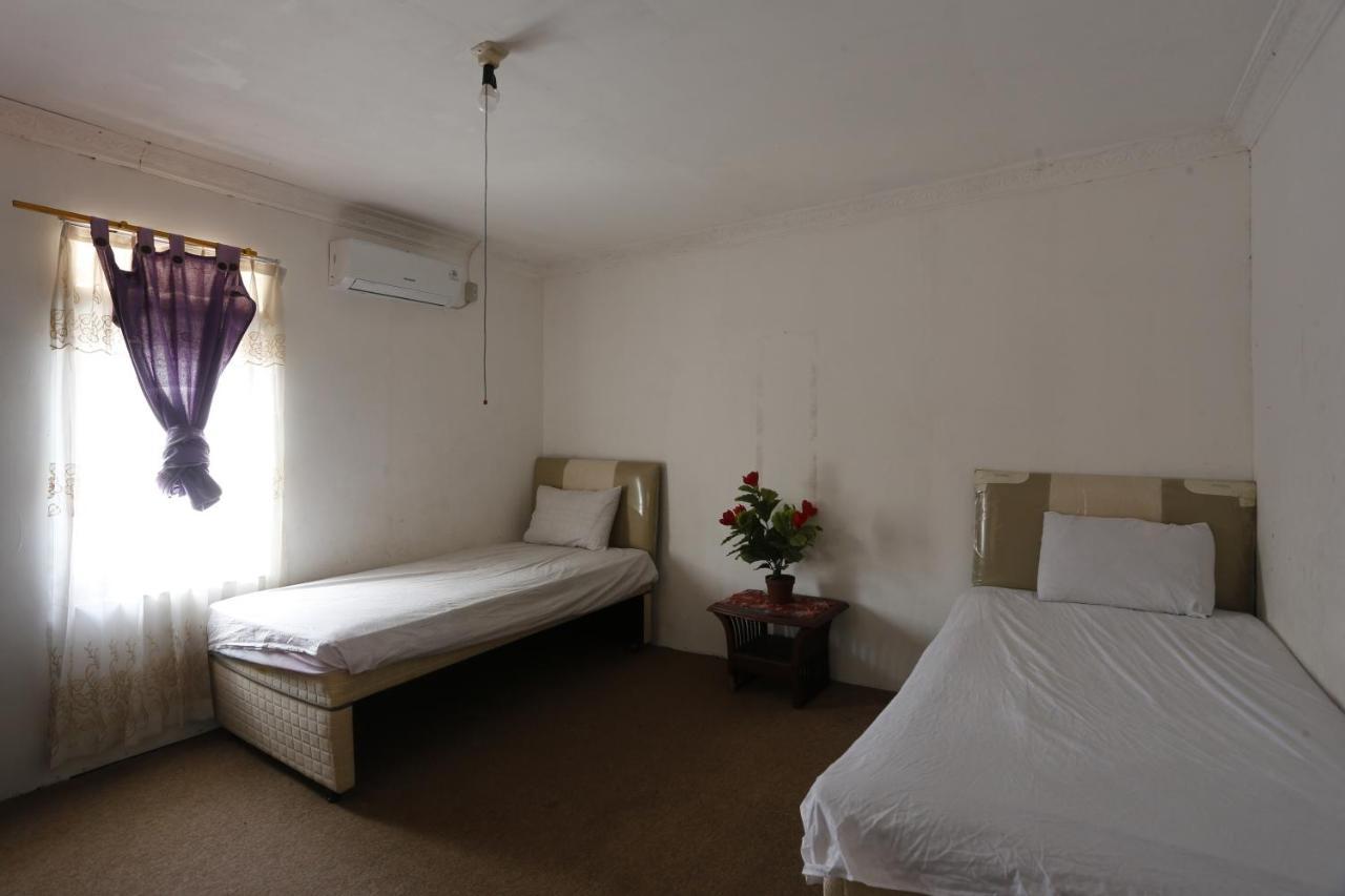 Oyo 93380 Penginapan Mangkoe Barokah Tanah Grogot Exteriör bild