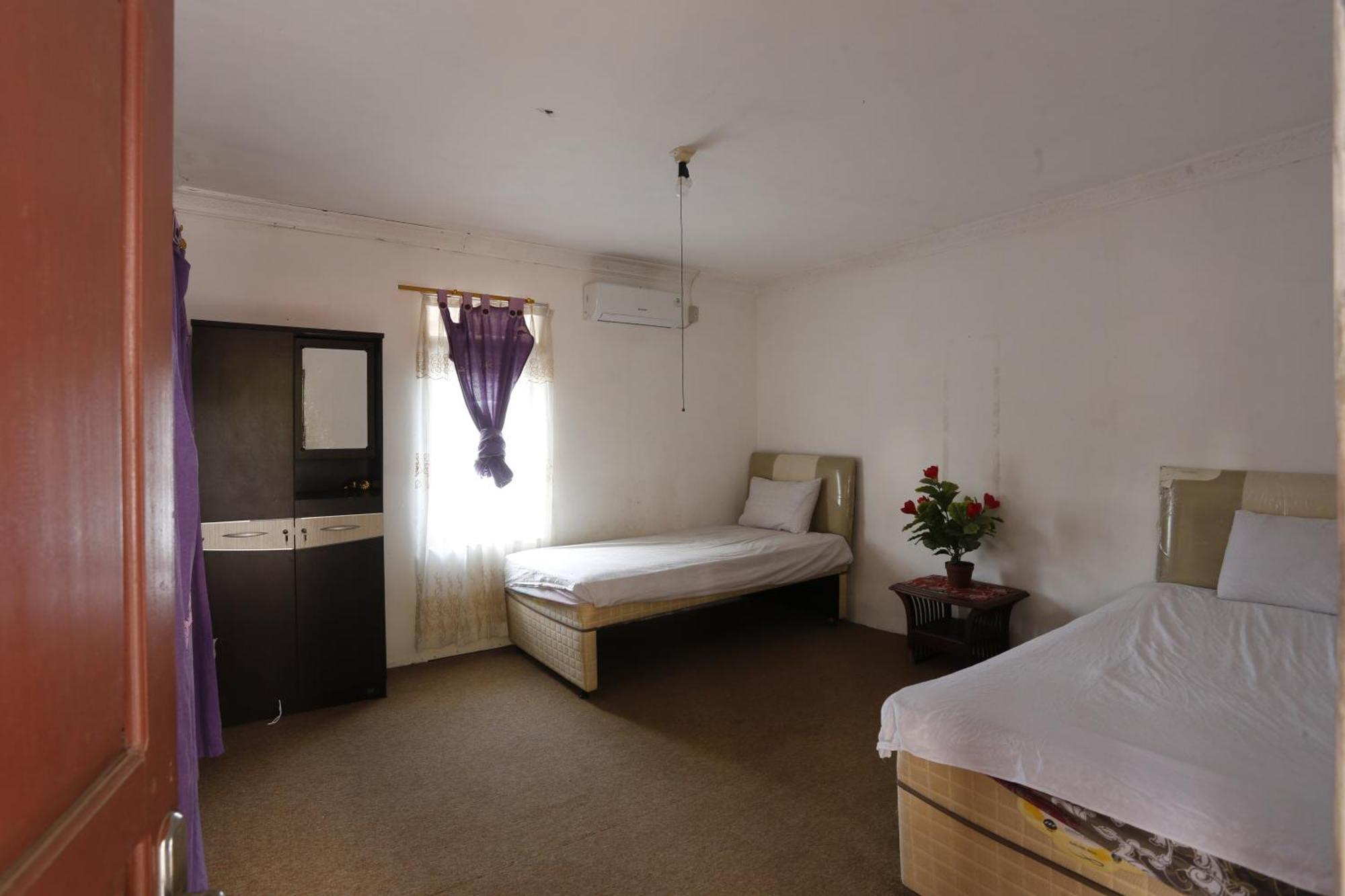 Oyo 93380 Penginapan Mangkoe Barokah Tanah Grogot Exteriör bild